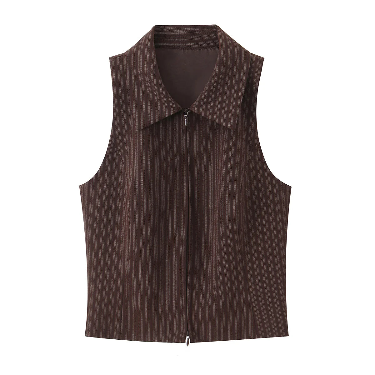 A brown vest paired with high-waisted brown pants creates a sleek, monochromatic look that feels both polished and effortlessly refined. The vest adds a tailored, structured edge—especially when worn fitted or slightly crop
