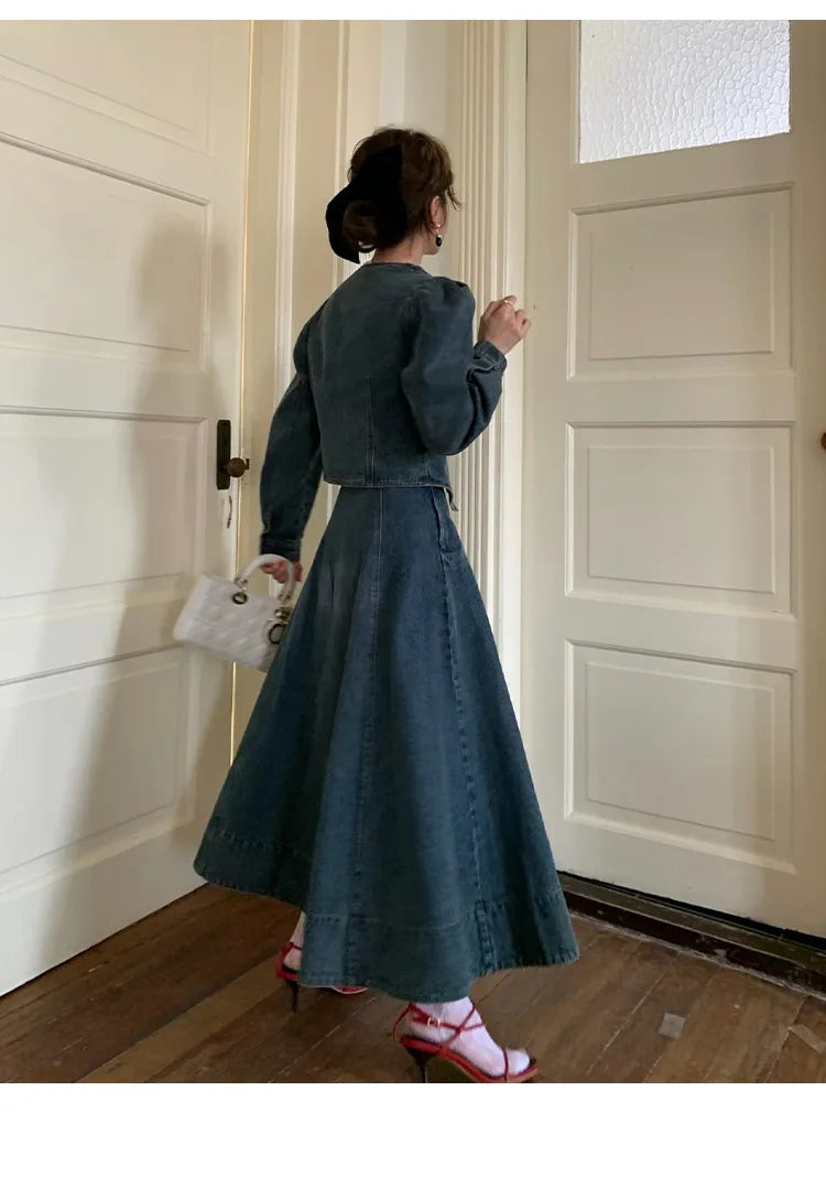 A denim top and long skirt set offers a timeless blend of effortless style and coordinated elegance. The structured denim top adds a flattering, tailored touch, while the flowing long skirt brings movement and grace, creating
