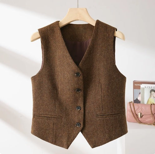 An “old money” vest captures the essence of quiet luxury through its timeless tailoring and understated elegance.