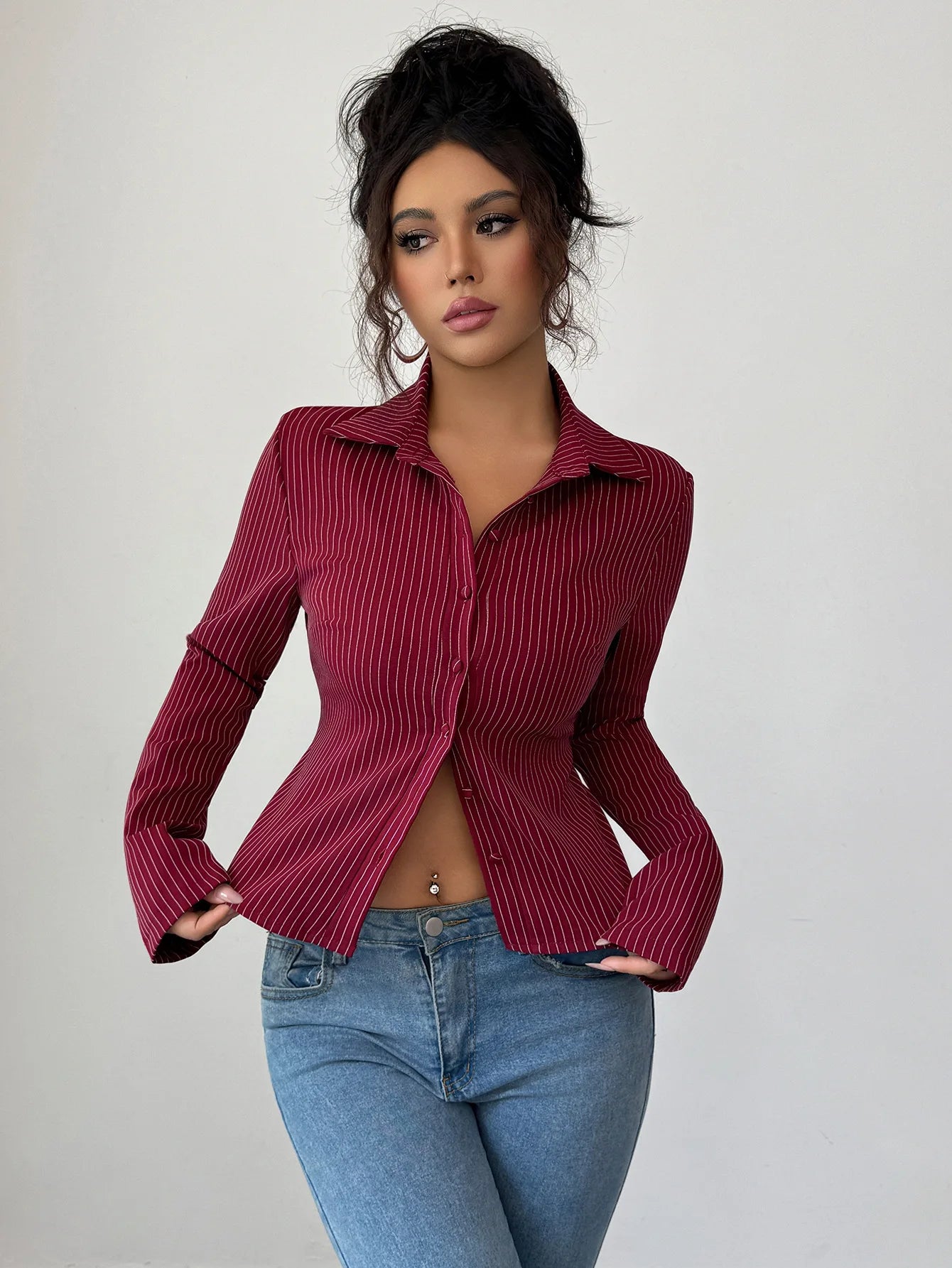 A fitted shirt is a wardrobe essential designed to contour the body while maintaining a clean, polished silhouette. Unlike relaxed or oversized styles, it follows the natural lines of the torso, creating a sharp and streamlin