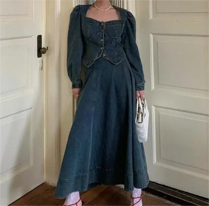 A denim top and long skirt set offers a timeless blend of effortless style and coordinated elegance. The structured denim top adds a flattering, tailored touch, while the flowing long skirt brings movement and grace, creating