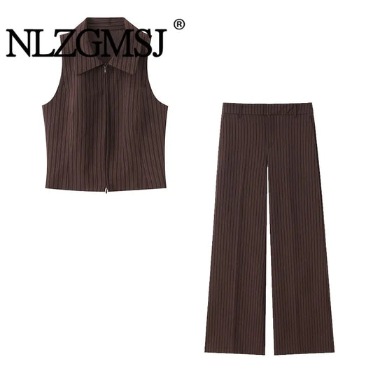 A brown vest paired with high-waisted brown pants creates a sleek, monochromatic look that feels both polished and effortlessly refined. The vest adds a tailored, structured edge—especially when worn fitted or slightly crop