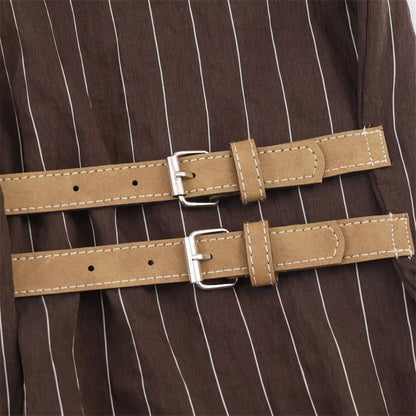 A women’s brown shirt in the “old money” aesthetic embodies quiet luxury and understated refinement. Typically crafted from high-quality fabrics like silk, fine cotton, or linen, it features a clean, tailored silhouette
