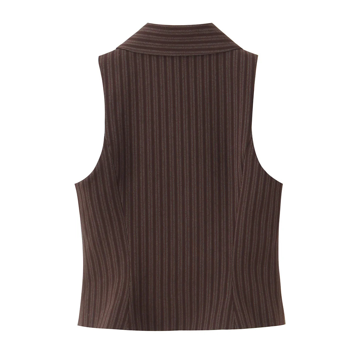 A brown vest paired with high-waisted brown pants creates a sleek, monochromatic look that feels both polished and effortlessly refined. The vest adds a tailored, structured edge—especially when worn fitted or slightly crop