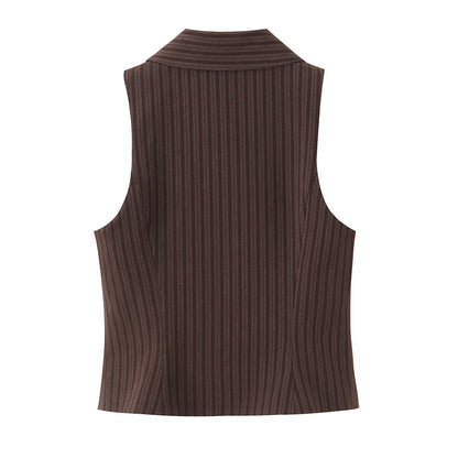 A brown vest paired with high-waisted brown pants creates a sleek, monochromatic look that feels both polished and effortlessly refined. The vest adds a tailored, structured edge—especially when worn fitted or slightly crop
