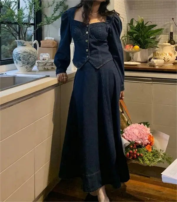 A denim top and long skirt set offers a timeless blend of effortless style and coordinated elegance. The structured denim top adds a flattering, tailored touch, while the flowing long skirt brings movement and grace, creating