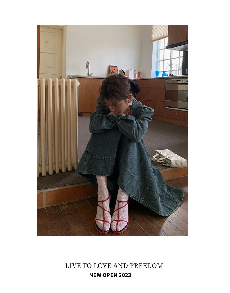 A denim top and long skirt set offers a timeless blend of effortless style and coordinated elegance. The structured denim top adds a flattering, tailored touch, while the flowing long skirt brings movement and grace, creating